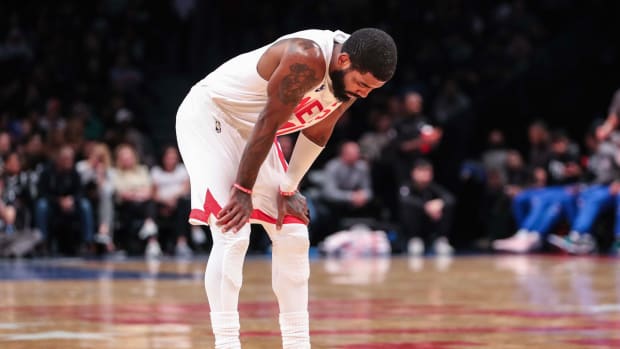 Kyrie Irving looks down during a game.